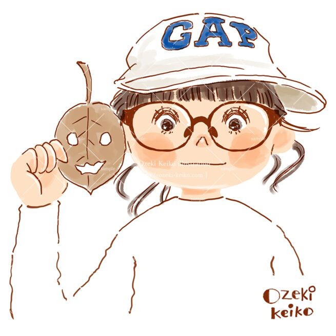 顔に見える落ち葉と女の子のイラスト